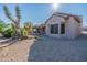 Single story home with desert landscaping and backyard patio at 20419 N Shadow Mountain Dr, Surprise, AZ 85374