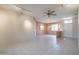 Open living area with tile floors and ceiling fan at 20419 N Shadow Mountain Dr, Surprise, AZ 85374