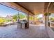 Covered patio with built-in BBQ and tile flooring at 20419 N Shadow Mountain Dr, Surprise, AZ 85374