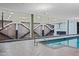 Indoor pool area with a view of a basketball court at 7167 E Rancho Vista Dr # 3003, Scottsdale, AZ 85251