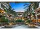 Stunning nighttime view of the building's exterior and courtyard at 7167 E Rancho Vista Dr # 3003, Scottsdale, AZ 85251