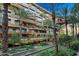 Modern building with palm trees and courtyard visible at 7167 E Rancho Vista Dr # 3003, Scottsdale, AZ 85251