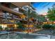 Evening view of the building's exterior, showcasing its architecture and landscaping at 7167 E Rancho Vista Dr # 3003, Scottsdale, AZ 85251