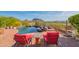 Enjoy breathtaking mountain views from this inviting pool and patio area at 13978 E Coyote E Rd, Scottsdale, AZ 85259