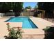 Refreshing swimming pool with a tanning ledge and water feature at 5342 W West Wind Dr, Glendale, AZ 85310