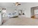 Large main bedroom with plush carpet and a ceiling fan at 3260 E Mead Dr, Gilbert, AZ 85298