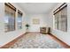 Bright home office with hardwood floors and large windows at 3260 E Mead Dr, Gilbert, AZ 85298