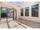 Inviting exterior with an ornate iron gate and a stucco facade at 3260 E Mead Dr, Gilbert, AZ 85298