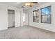 Bright bedroom featuring carpet, large closet, and neutral walls at 3260 E Mead Dr, Gilbert, AZ 85298