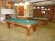 Community game room featuring billiard tables and a stone fireplace at 13330 W Milton Dr, Peoria, AZ 85383