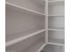 Large walk-in pantry with ample shelving for storage at 23148 E Carriage Way, Queen Creek, AZ 85142