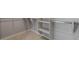 Large walk-in closet with shelving and hanging rods at 23148 E Carriage Way, Queen Creek, AZ 85142