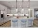 Modern kitchen with large island and stainless steel appliances at 23148 E Carriage Way, Queen Creek, AZ 85142