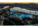 Night view of community pool and lake at 23148 E Carriage Way, Queen Creek, AZ 85142