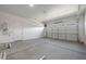 Spacious two-car garage with ample storage space at 23148 E Carriage Way, Queen Creek, AZ 85142