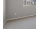 Simple bedroom with neutral walls and carpet flooring at 23148 E Carriage Way, Queen Creek, AZ 85142
