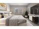 Comfortable bedroom with large bed and TV at 23148 E Carriage Way, Queen Creek, AZ 85142