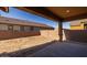 Covered patio overlooking the backyard at 23148 E Carriage Way, Queen Creek, AZ 85142