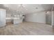 Spacious living room with hardwood floors and lots of natural light at 23148 E Carriage Way, Queen Creek, AZ 85142