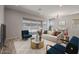 Spacious living room with plush seating and large windows at 23148 E Carriage Way, Queen Creek, AZ 85142