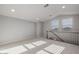 Open and airy living room with natural light at 23148 E Carriage Way, Queen Creek, AZ 85142