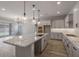 Spacious kitchen with an expansive island and stainless steel appliances at 23148 E Carriage Way, Queen Creek, AZ 85142