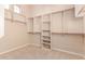 Large walk-in closet with ample shelving and hanging space at 2069 E Cedar Pl, Chandler, AZ 85249