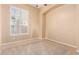 Bright bedroom with plantation shutters and neutral-toned walls at 2069 E Cedar Pl, Chandler, AZ 85249