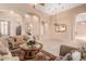 Open living room with a view into the kitchen at 2069 E Cedar Pl, Chandler, AZ 85249