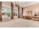 Spacious living room with large windows and high ceilings at 2069 E Cedar Pl, Chandler, AZ 85249