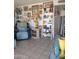 Living room with tiled floors and gallery wall at 9627 W North Ln # B, Peoria, AZ 85345