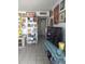 Living room with tiled floors and eclectic decor at 9627 W North Ln # B, Peoria, AZ 85345