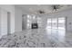 Living room with built-in shelving and fireplace at 12942 S 192Nd Ave, Buckeye, AZ 85326