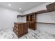 Bright walk-in closet with custom built-ins at 12942 S 192Nd Ave, Buckeye, AZ 85326