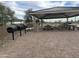 Multiple BBQ grills are available in a covered pavilion setting at 15788 W Mariposa Grande Ave, Surprise, AZ 85387