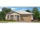 One-story home with a two-car garage and attractive landscaping at 15788 W Mariposa Grande Ave, Surprise, AZ 85387