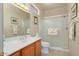 Clean bathroom with shower and updated vanity at 15717 W Linksview Dr, Surprise, AZ 85374