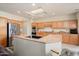 Spacious kitchen with stainless steel appliances and granite countertops at 15717 W Linksview Dr, Surprise, AZ 85374