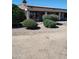 Home's exterior features a covered patio and well-manicured landscaping at 15717 W Linksview Dr, Surprise, AZ 85374