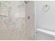 Bathroom with marble-look shower and modern fixtures at 17627 N 14Th Ave, Phoenix, AZ 85023