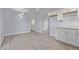 Light dining area with wood-look floors and pendant lighting at 17627 N 14Th Ave, Phoenix, AZ 85023