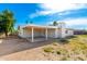 Home exterior showcasing a covered patio area at 17627 N 14Th Ave, Phoenix, AZ 85023