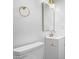 Clean bathroom with white vanity and gold accents at 17627 N 14Th Ave, Phoenix, AZ 85023