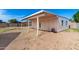 Backyard with covered patio and detached structure at 17627 N 14Th Ave, Phoenix, AZ 85023