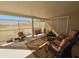Covered patio with comfortable seating and a view of the community at 650 N Hawes Rd # 4956, Mesa, AZ 85207