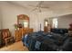 Main bedroom with wood floors and mirrored dresser at 650 N Hawes Rd # 4956, Mesa, AZ 85207