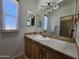 Bathroom with vanity, sink, and a large mirror at 650 N Hawes Rd # 4956, Mesa, AZ 85207