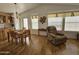 Light and bright dining area with wood floors and a view to backyard at 650 N Hawes Rd # 4956, Mesa, AZ 85207