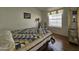 Bedroom with a full-size bed and an armchair at 650 N Hawes Rd # 4956, Mesa, AZ 85207
