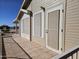 Home exterior with covered patio and screen doors at 650 N Hawes Rd # 4956, Mesa, AZ 85207